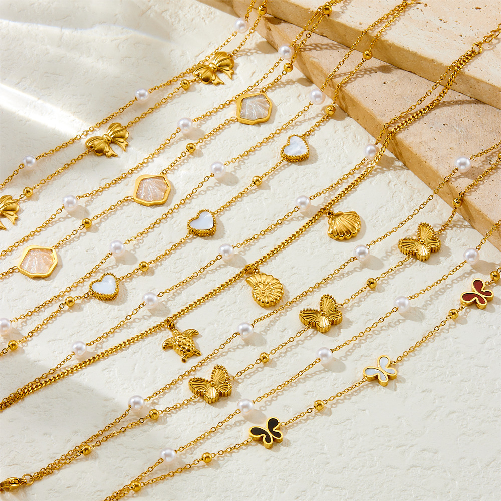 Stylish and simple colorful shimmering seashell and butterfly double-layered beach style stainless steel chain pearl starfish anklet