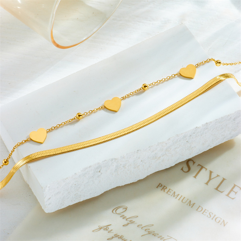 Unique design, heart-shaped chain, double-layered, gold-plated titanium steel, fashionable and versatile anklet.