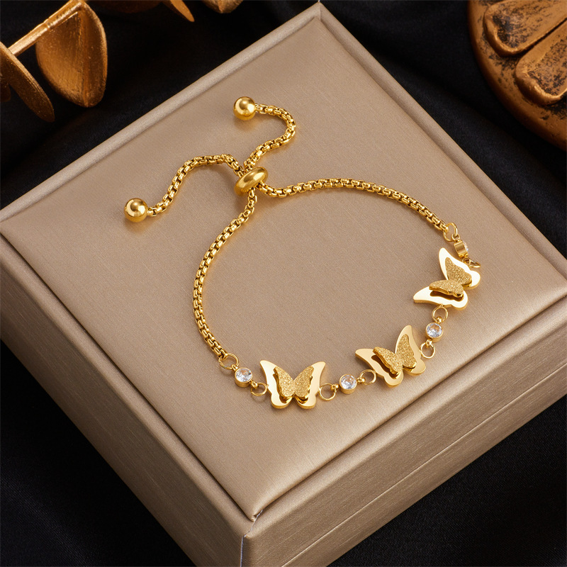 Niche design, simple and versatile, stylish and retro gold titanium steel pull-out 3D butterfly chain accessory bracelet.