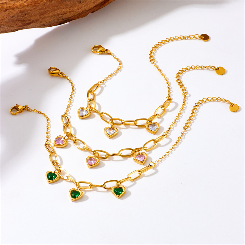 European and American niche retro gold-plated versatile fashion colored gemstone heart pendant titanium steel chain bracelet