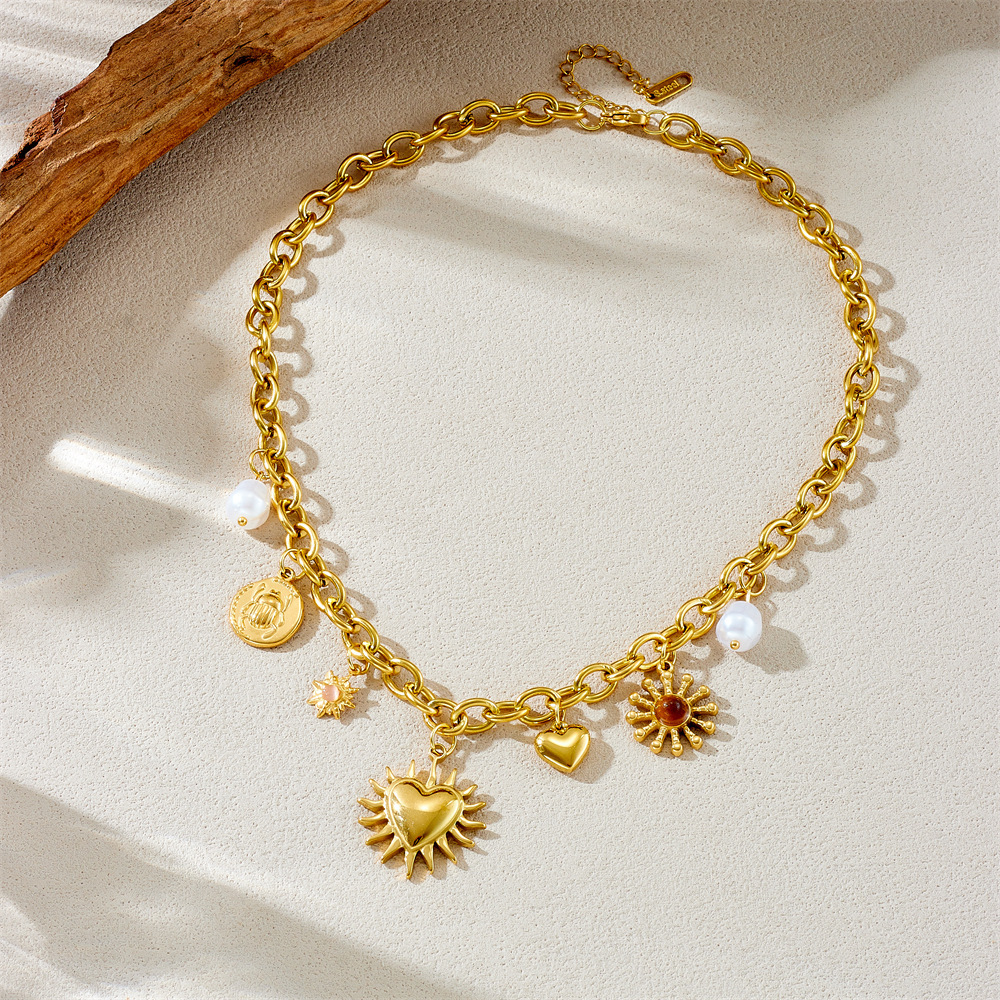 European and American cross-border fashion retro gold-plated chunky chain sun heart pearl insect round pendant stainless steel necklace
