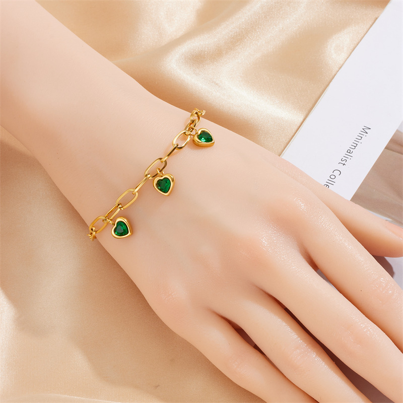 European and American niche retro gold-plated versatile fashion colored gemstone heart pendant titanium steel chain bracelet