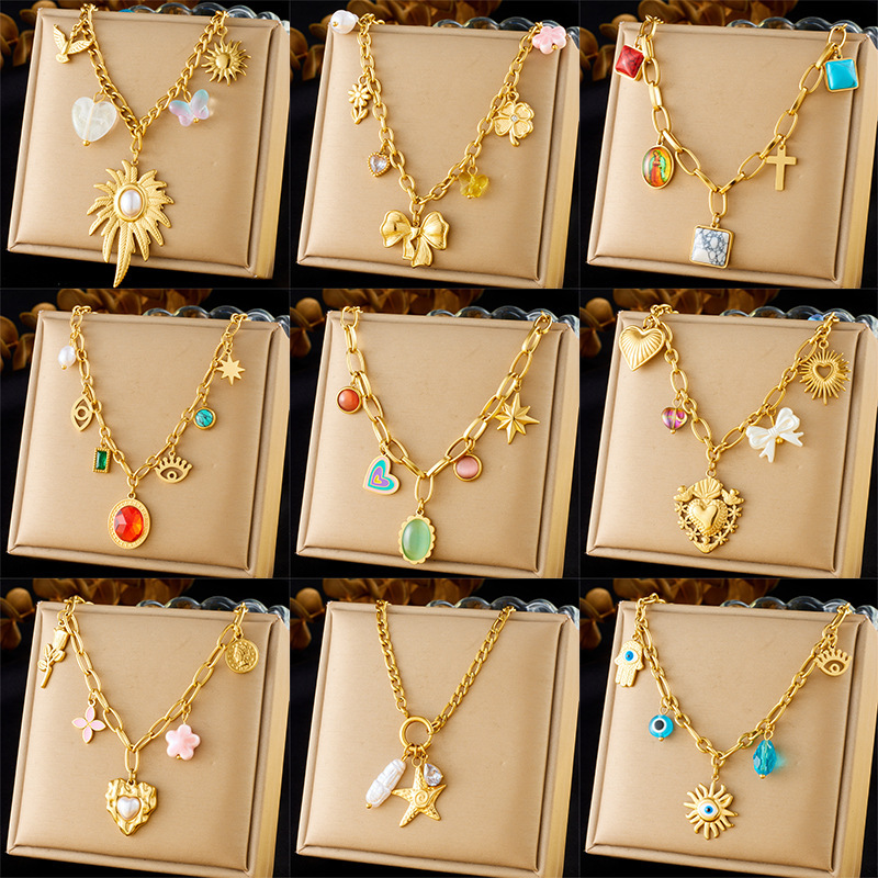 French retro-style embossed heart pearl clavicle necklace with a sophisticated pink flower round gemstone chunky knit sweater chain.