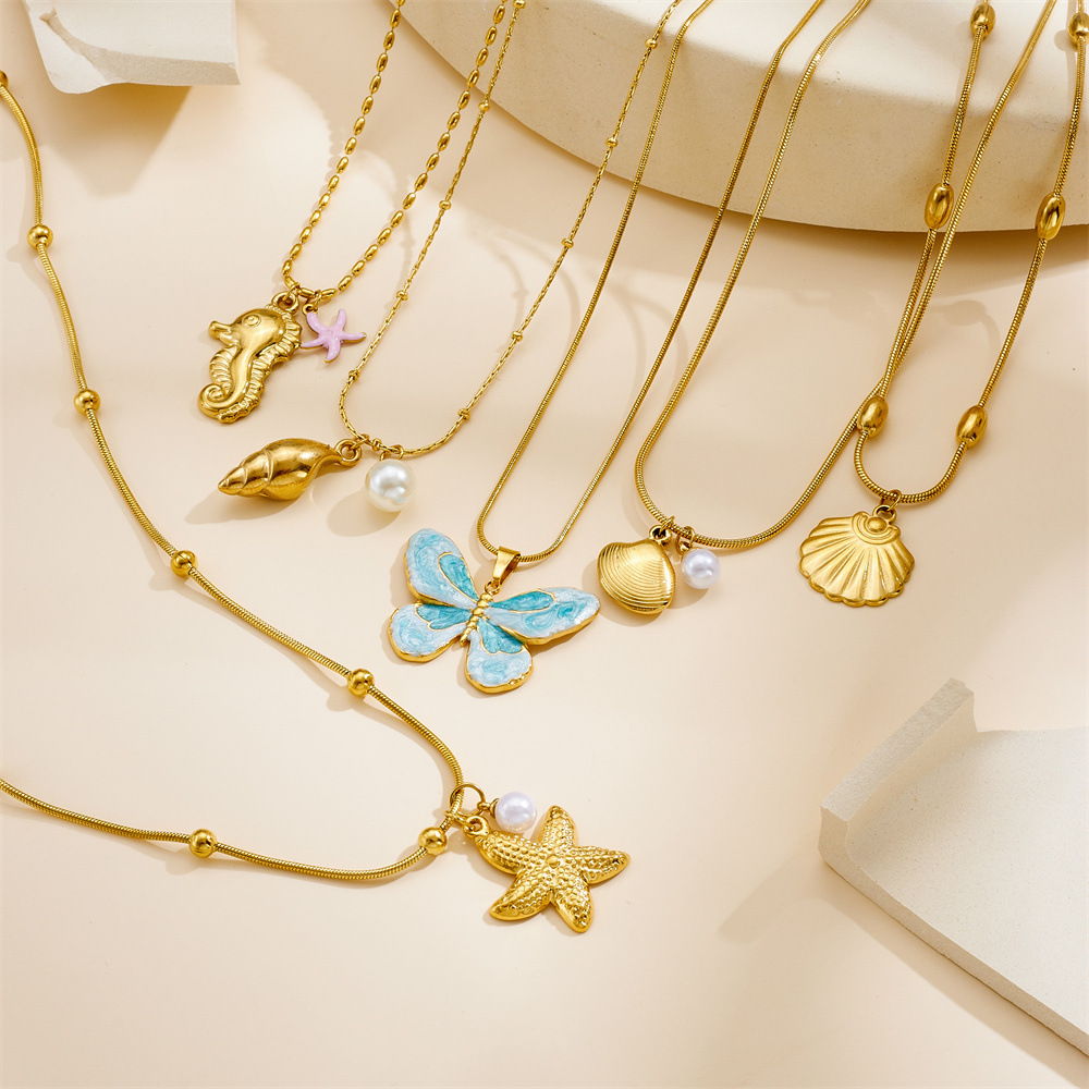 Cross-border fashion ocean series accessories pendant gold-plated stainless steel starfish shell multi-element dripping butterfly necklace