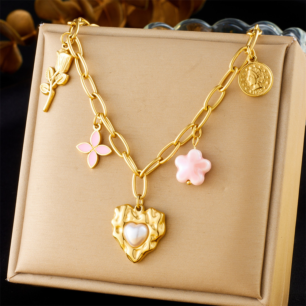 French retro-style embossed heart pearl clavicle necklace with a sophisticated pink flower round gemstone chunky knit sweater chain.