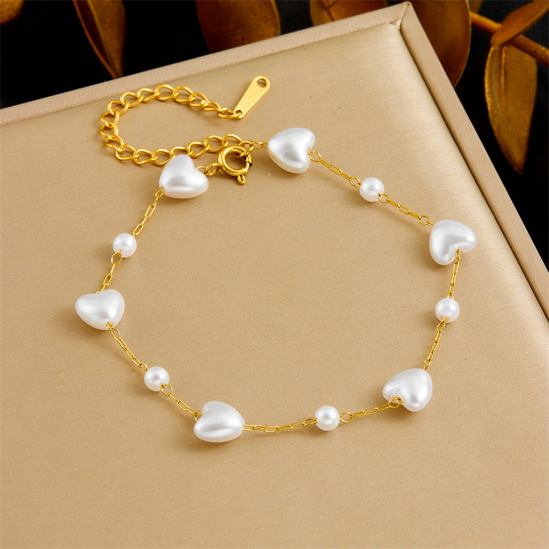 Cross-border fashion, elegant retro versatile pearl heart chain stainless steel accessory bracelet and necklace set