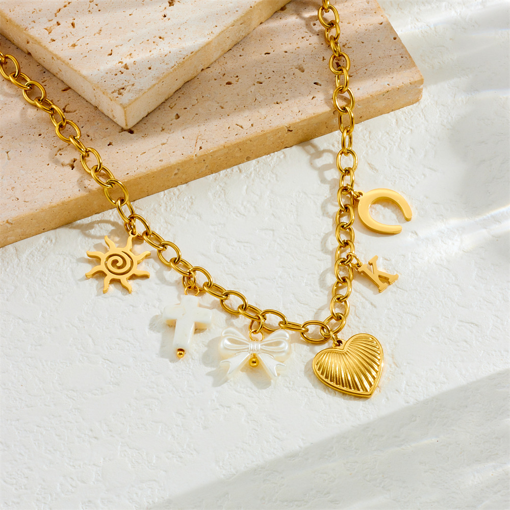New cross-border fashion retro multi-element heart bow seashell cherry cross eye chain necklace