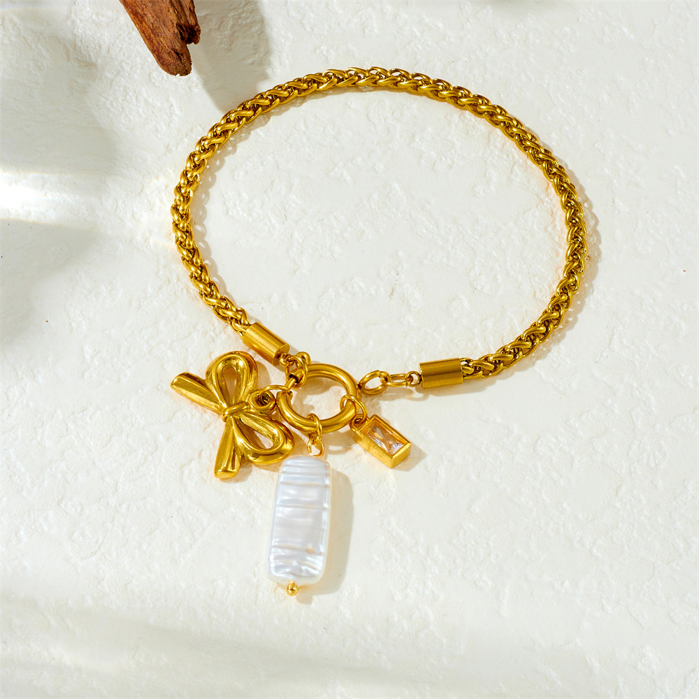 Korean style, fashionable and elegant, simple gold-plated braided chain with bow and seashell pendant, stainless steel gold-plated bracelet.