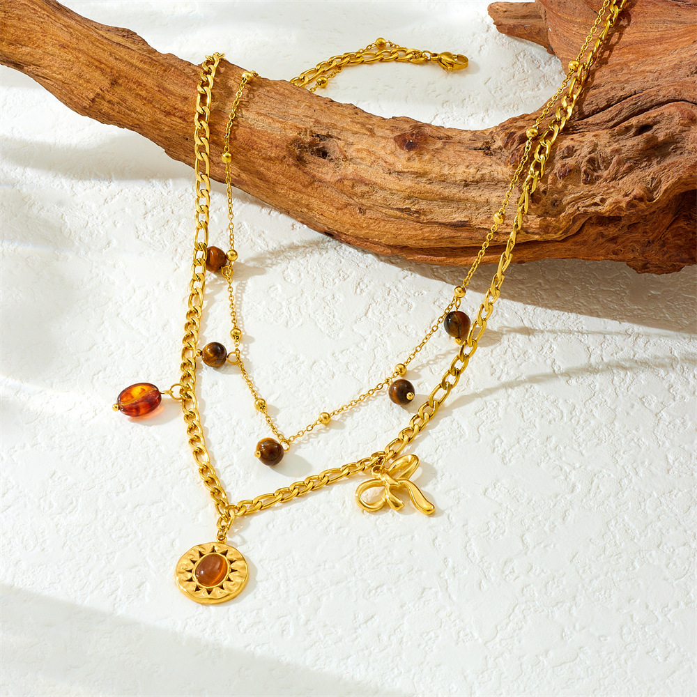 French vintage style round tiger's eye sun pendant necklace with bow accessory, stainless steel double-layered clavicle chain