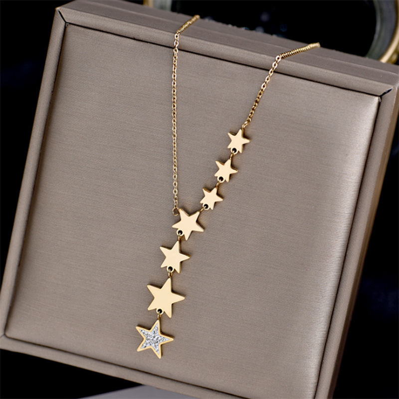 Korean style, fashionable and simple, diamond-encrusted five-pointed star tassel titanium steel pendant, seven-star clavicle chain, elegant and versatile jewelry necklace.