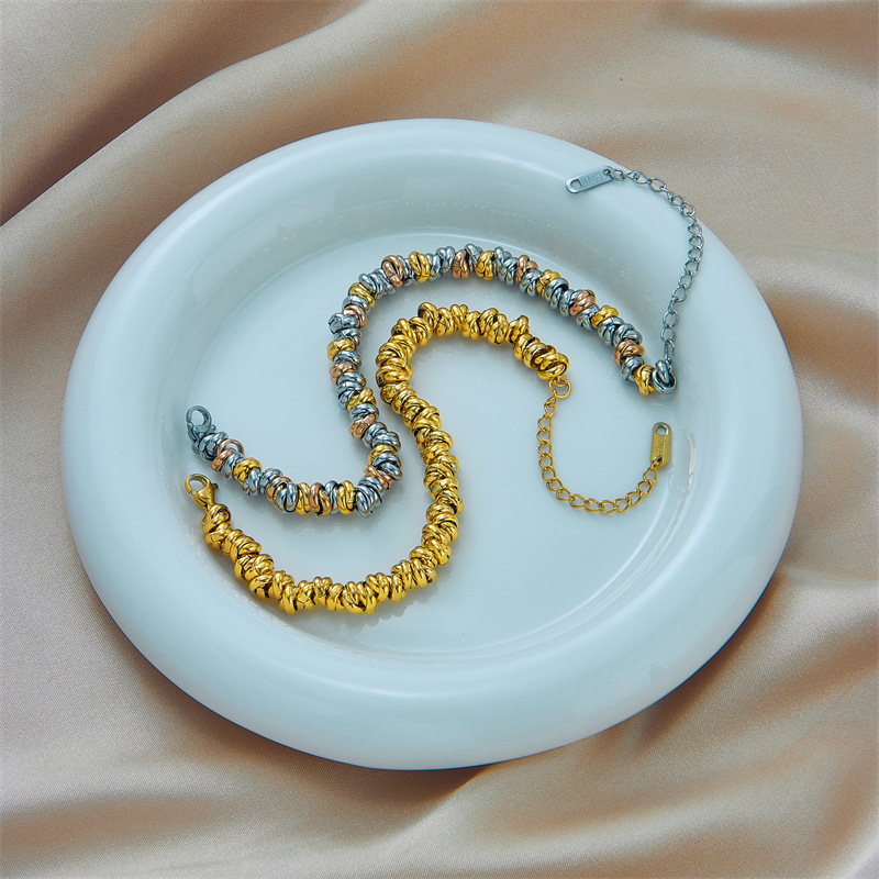 European and American cross-border fashion minimalist color-blocked titanium steel metal circle beaded woven retro versatile bracelet