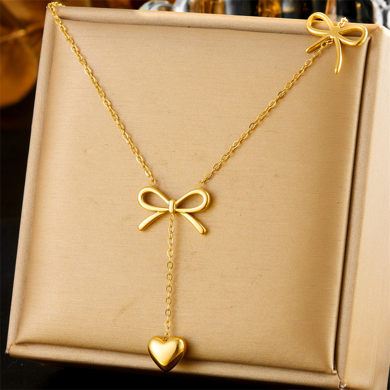 Fashionable, cross-border, niche, minimalist gold-plated stainless steel long tassel chain bow pendant necklace