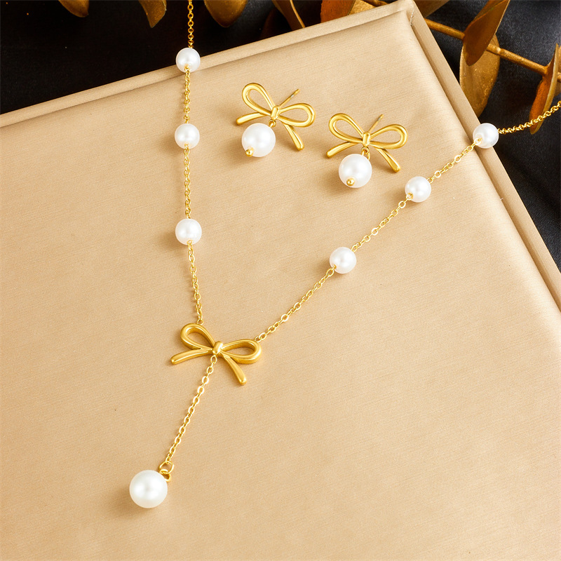 Korean style fashionable cross-border new stainless steel gold-plated pearl bow earrings chain tassel necklace jewelry set