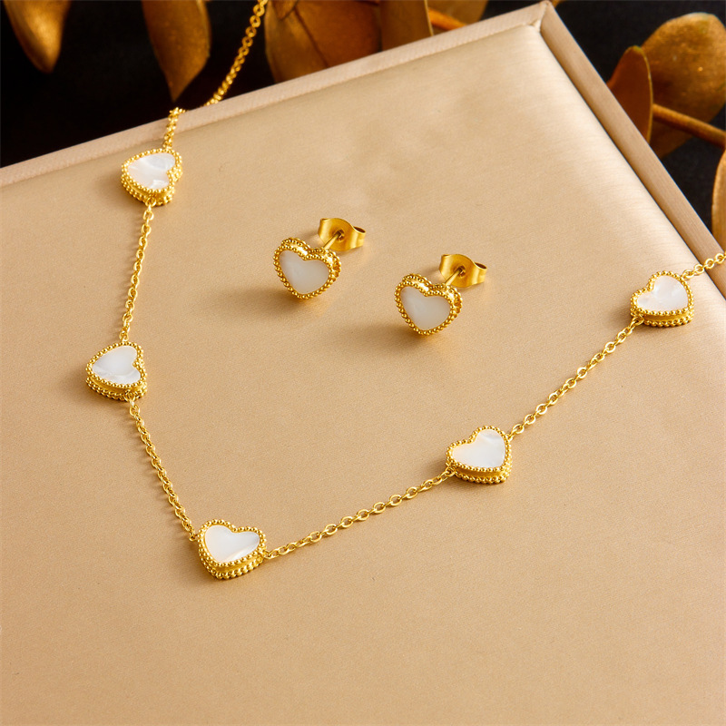 New European and American style fashionable seashell heart retro stainless steel clavicle chain bracelet earring necklace set