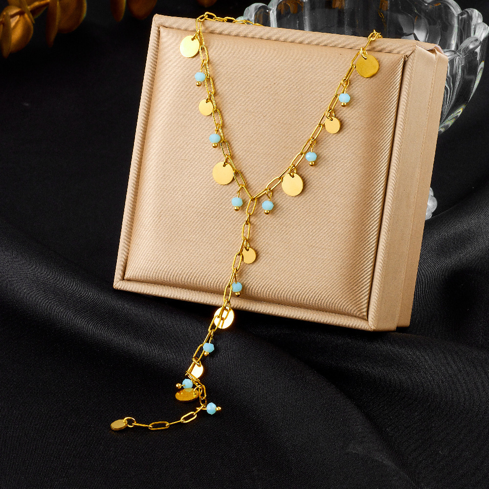 New, unique, versatile, and simple stainless steel necklace with rhinestone-studded heart-shaped accessories and Y-shaped long tassel.