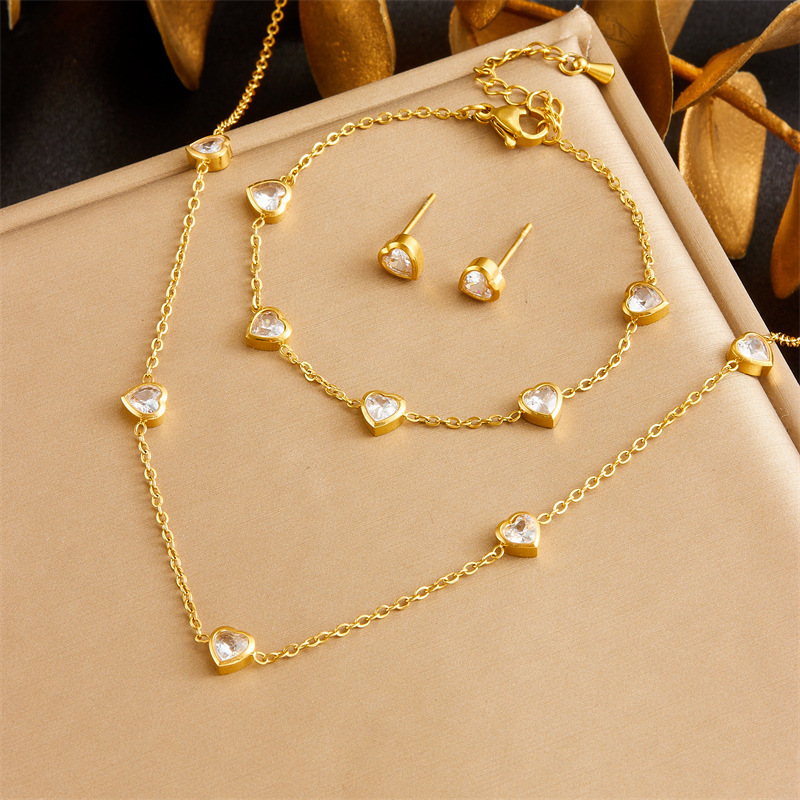 European and American cross-border fashion niche transparent heart accessories gold-plated stainless steel chain bracelet earring necklace set