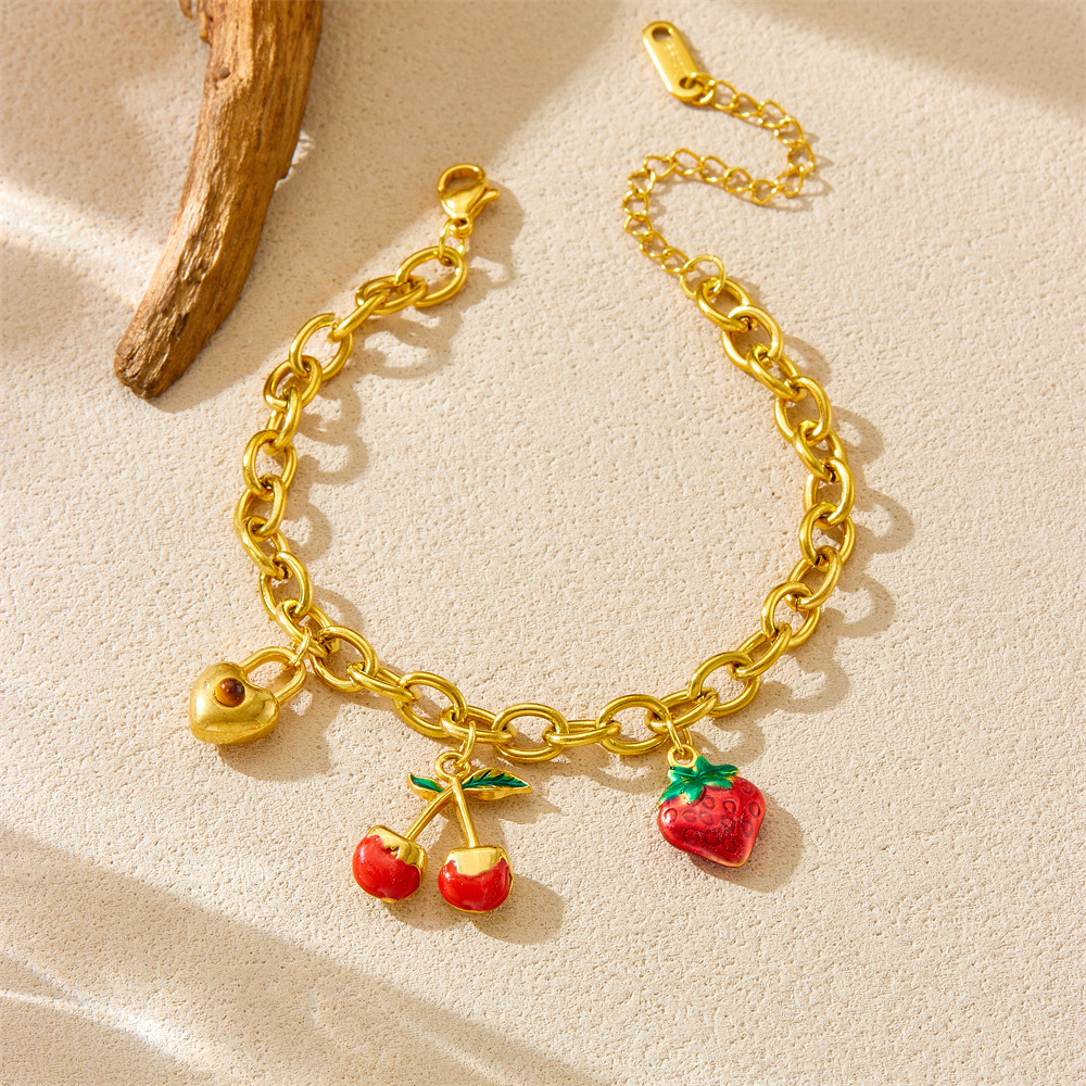 Sweet and natural cherry heart lock pendant for women, versatile and high-end stainless steel gold-plated bracelet, perfect for summer.