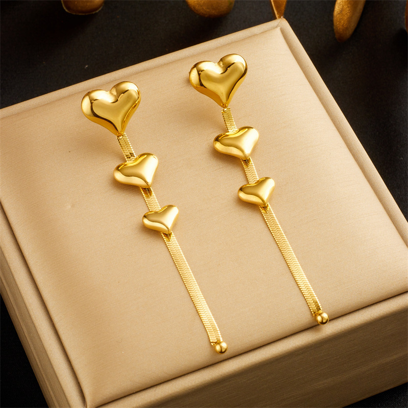European and American fashion niche design long chain tassel heart accessory titanium steel gold-plated earrings