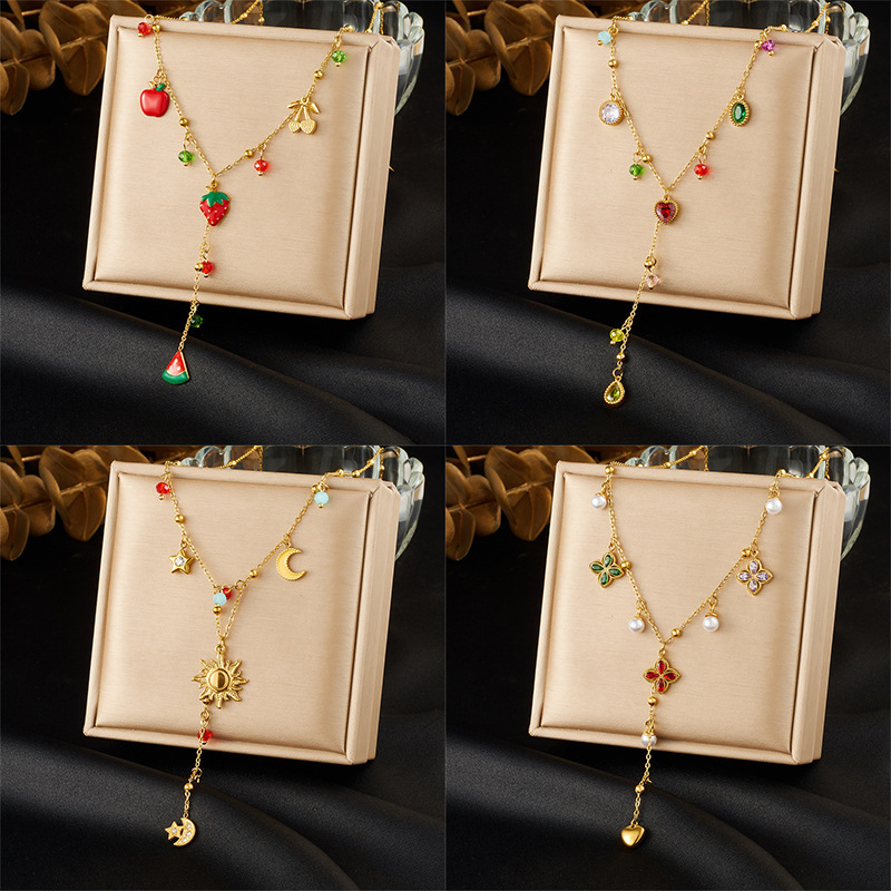 Korean style fashionable colored glass rhinestone geometric pendant with dripping strawberry fruit design, gold-plated stainless steel Y-shaped necklace.