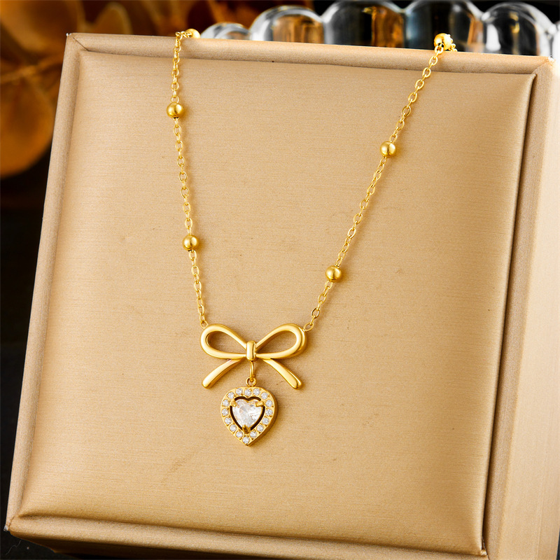Korean style smooth bow diamond heart pendant, sweet and luxurious high-end clavicle chain stainless steel jewelry necklace