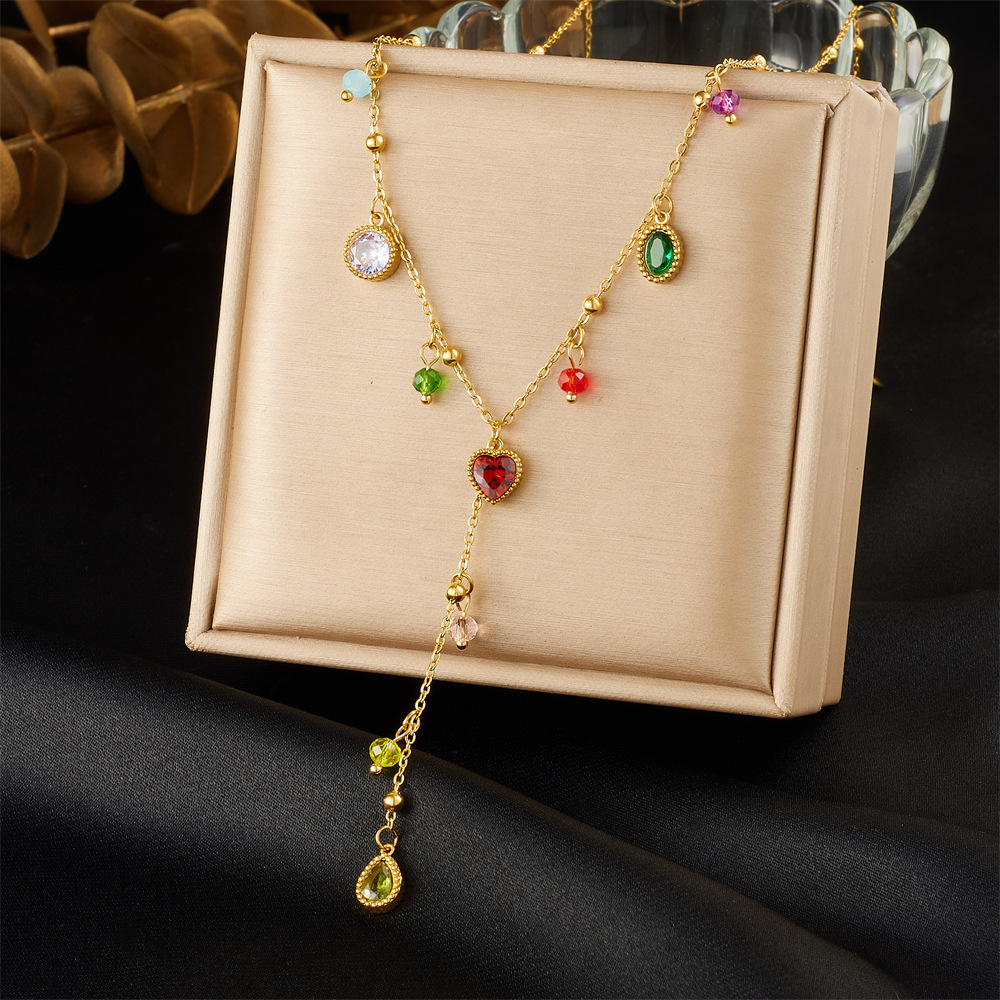 Korean style fashionable colored glass rhinestone geometric pendant with dripping strawberry fruit design, gold-plated stainless steel Y-shaped necklace.