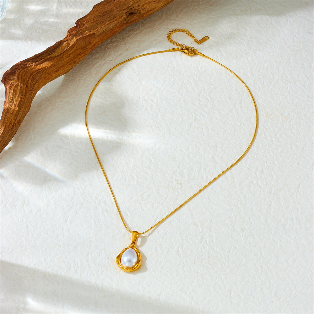 Cross-border fashion niche retro versatile teardrop-shaped pearl irregular pendant chain stainless steel women's necklace