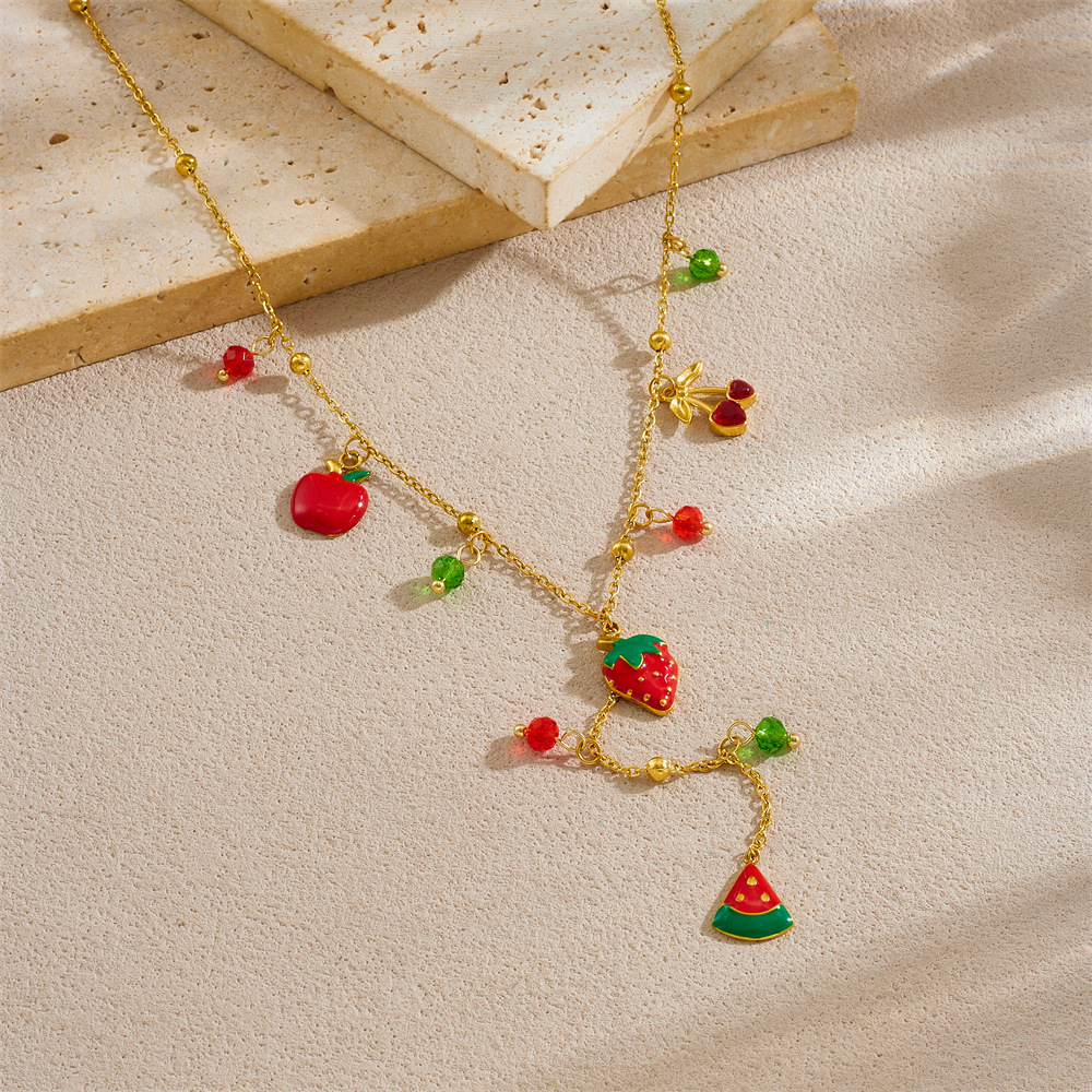 Korean style fashionable colored glass rhinestone geometric pendant with dripping strawberry fruit design, gold-plated stainless steel Y-shaped necklace.