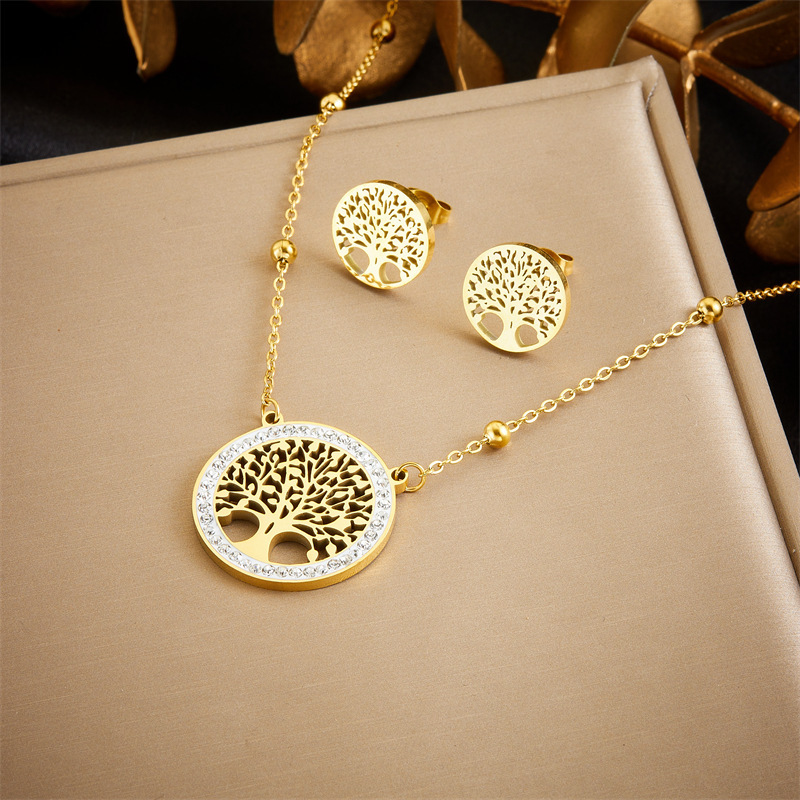 European and American fashion niche design round hollow tree of life pendant accessories stainless steel stud earrings and necklace set