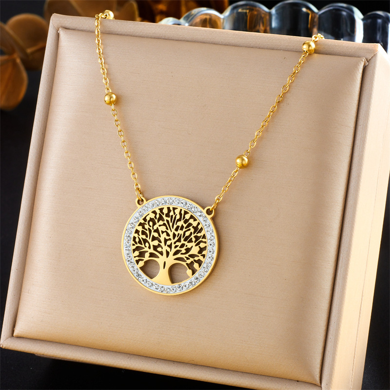 European and American fashion niche design round hollow tree of life pendant accessories stainless steel stud earrings and necklace set