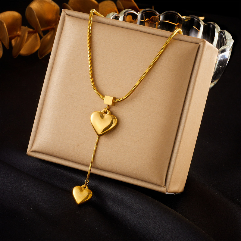 Cross-border fashion minimalist metal high-end cool style heart pendant tassel chain stainless steel gold-plated necklace