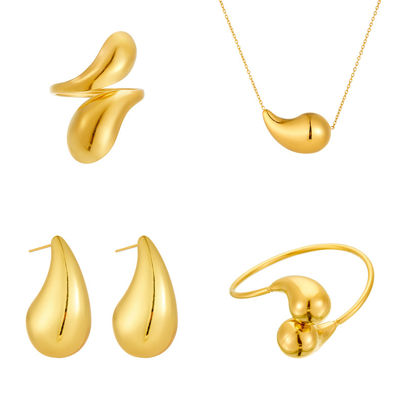 Bestselling European and American style stainless steel hollow smooth teardrop bracelet, stainless steel material, gold and silver comma-shaped open set