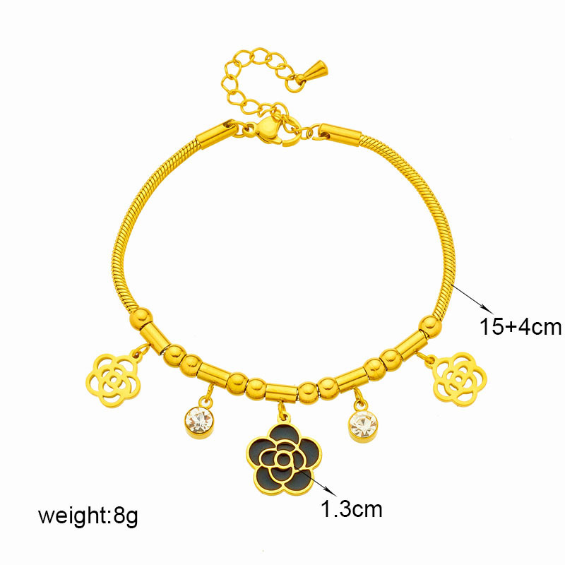 Niche design, stylish and minimalist French retro style, hollowed-out camellia pendant with diamond setting, titanium steel chain.