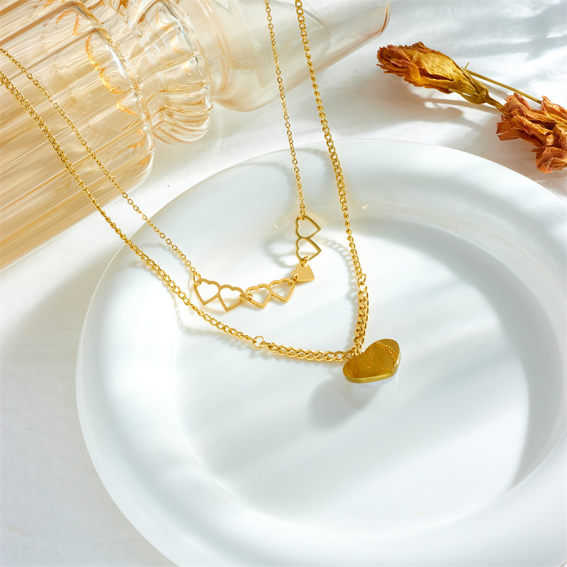 European and American fashion creative unique double-layered hollow double heart pendant chain pearl peach heart necklace