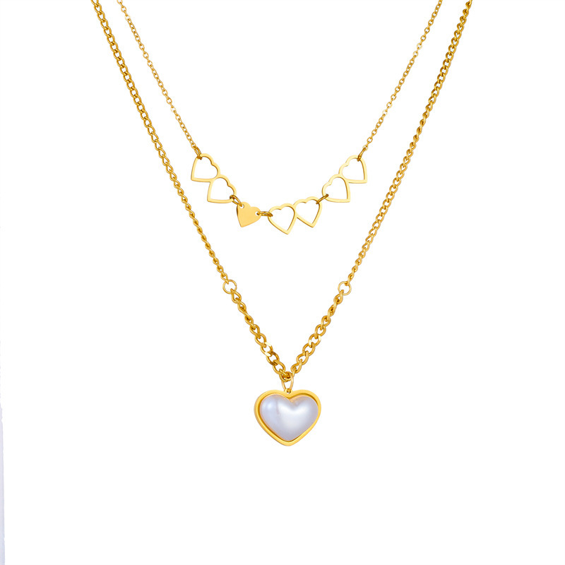 European and American fashion creative unique double-layered hollow double heart pendant chain pearl peach heart necklace