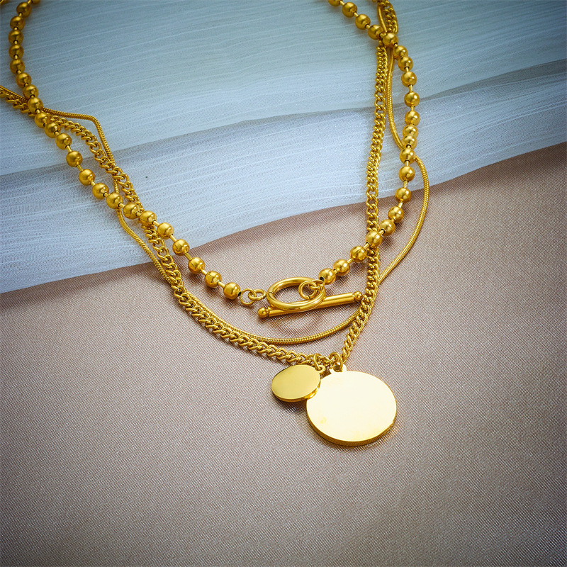 European and American cross-border retro multi-layered round pendant with woman's head portrait, OT buckle titanium steel metal light luxury niche necklace