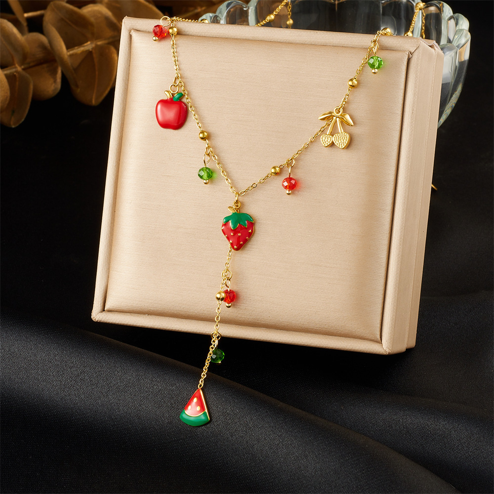 Korean style fashionable colored glass rhinestone geometric pendant with dripping strawberry fruit design, gold-plated stainless steel Y-shaped necklace.