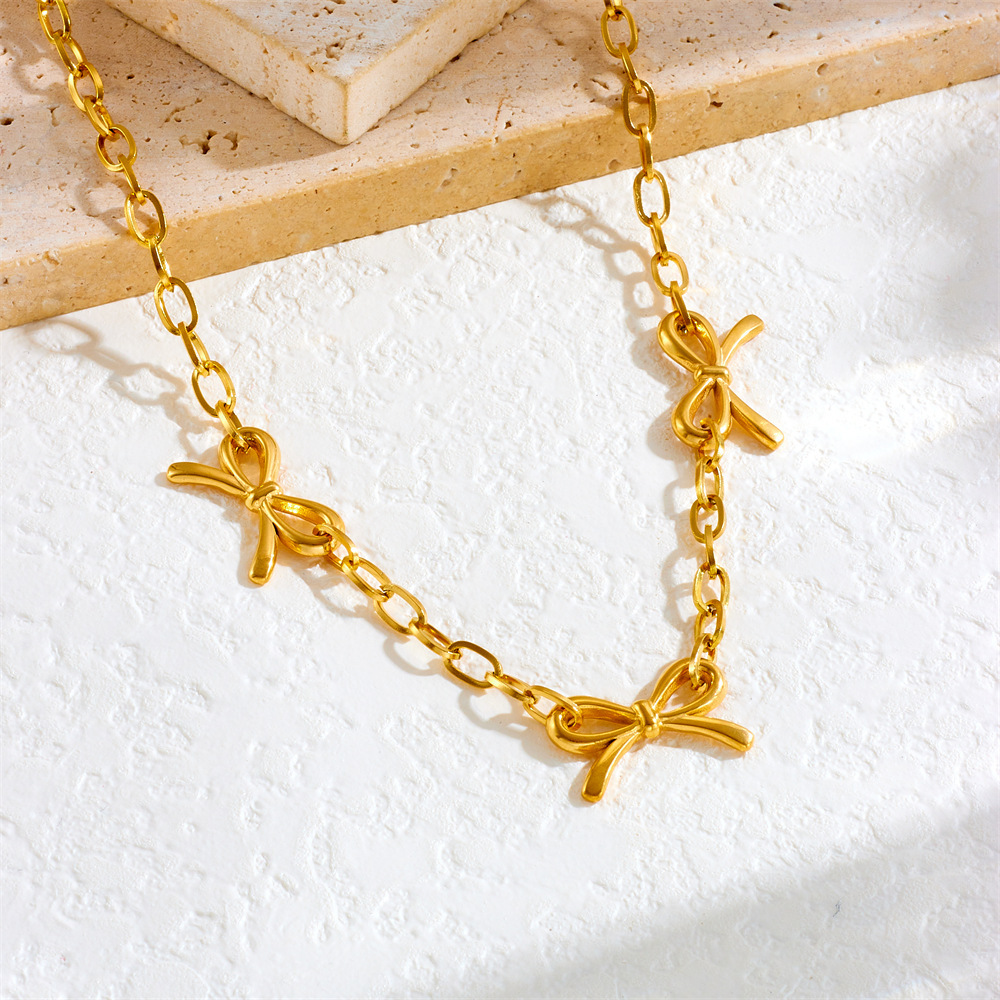 Cross-border fashion minimalist punk retro metal gold-plated stainless steel cross chain bow accessory necklace