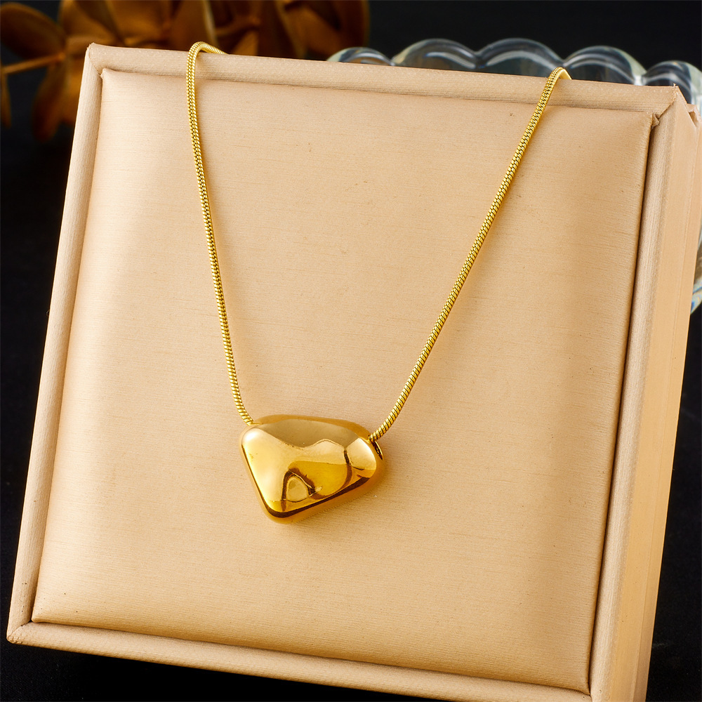 European and American cross-border fashion retro gold-plated irregular lava heart geometric pendant snake bone chain stainless steel necklace