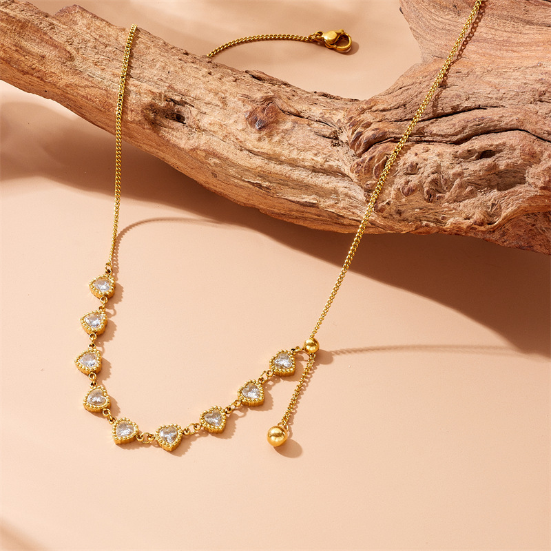 Korean style, fashionable, simple, versatile, rhinestone-encrusted heart-shaped beaded long tassel chain stainless steel gold-plated jewelry necklace
