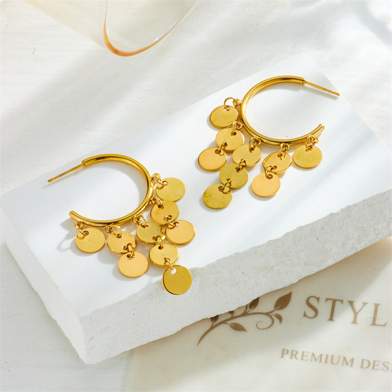 Niche fashion retro high-end luxury gold round tassel pendant titanium steel earrings