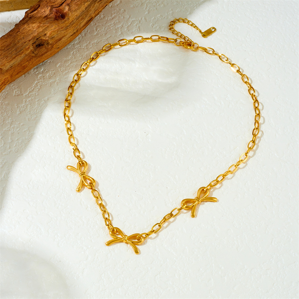 Cross-border fashion minimalist punk retro metal gold-plated stainless steel cross chain bow accessory necklace