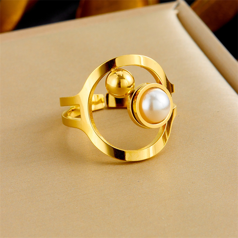 Fashionable, cross-border, light luxury, elegant round pearl gold bean clavicle chain, double-layered necklace, earrings, and ring set.