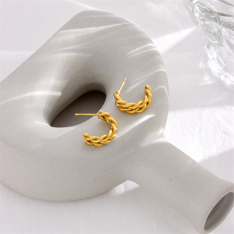 Stylish, versatile, and sophisticated minimalist woven cable knit gold-plated stainless steel earrings