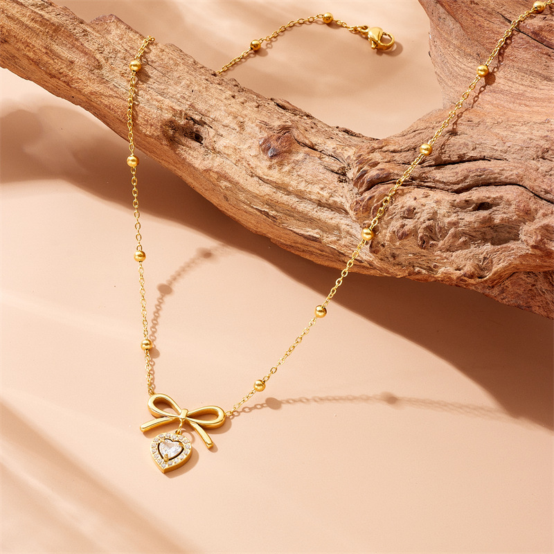Korean style smooth bow diamond heart pendant, sweet and luxurious high-end clavicle chain stainless steel jewelry necklace