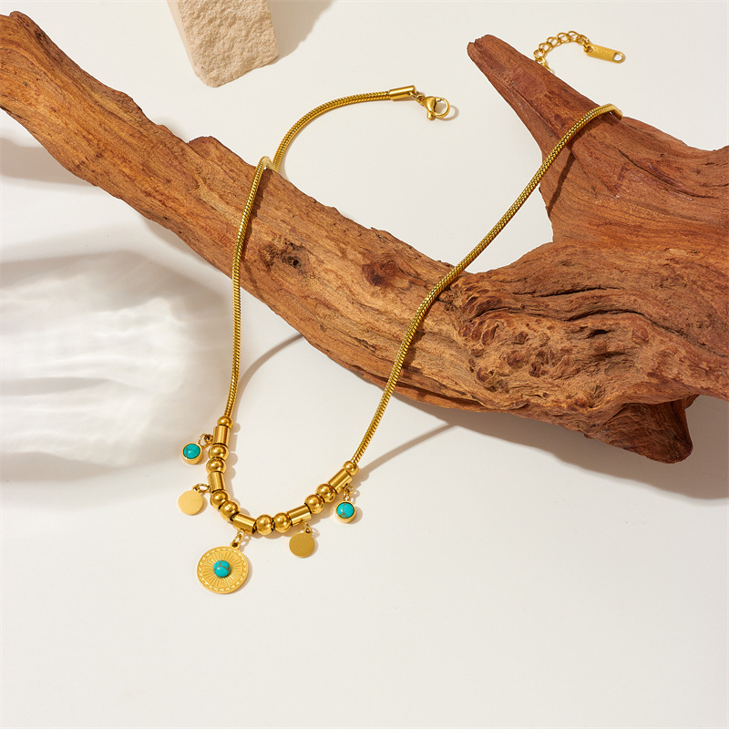 High-end European and American style, niche design, titanium steel metal turquoise round pendant jewelry, simple and elegant necklace.