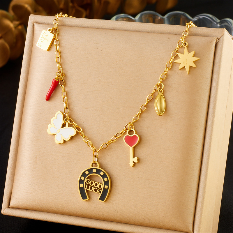 European and American style hollowed-out round brand epoxy elephant sweater chain stainless steel color-preserving accessory goldfish pendant necklace