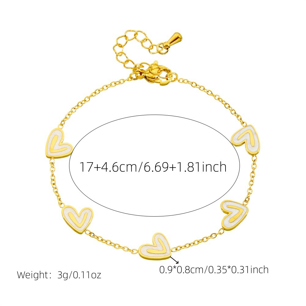 Stylish and exquisite white shell heart accessory clavicle chain, stainless steel stud earrings, necklace, and bracelet – a versatile women's set.