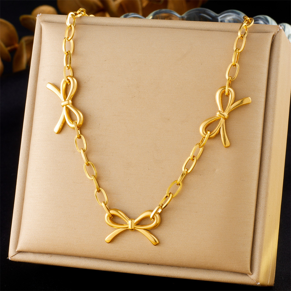 Cross-border fashion minimalist punk retro metal gold-plated stainless steel cross chain bow accessory necklace
