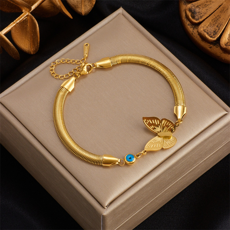 European and American style niche design, elegant retro light luxury three-dimensional butterfly eye turquoise pendant titanium steel bracelet