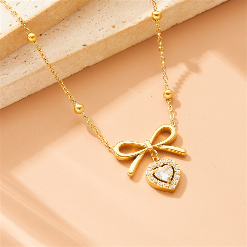 Korean style smooth bow diamond heart pendant, sweet and luxurious high-end clavicle chain stainless steel jewelry necklace